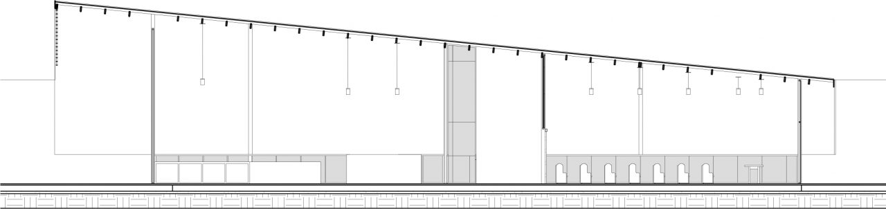 Capilla de Velación Santa Rosa con volumen ascendente, jardines y pasillo central iluminado.