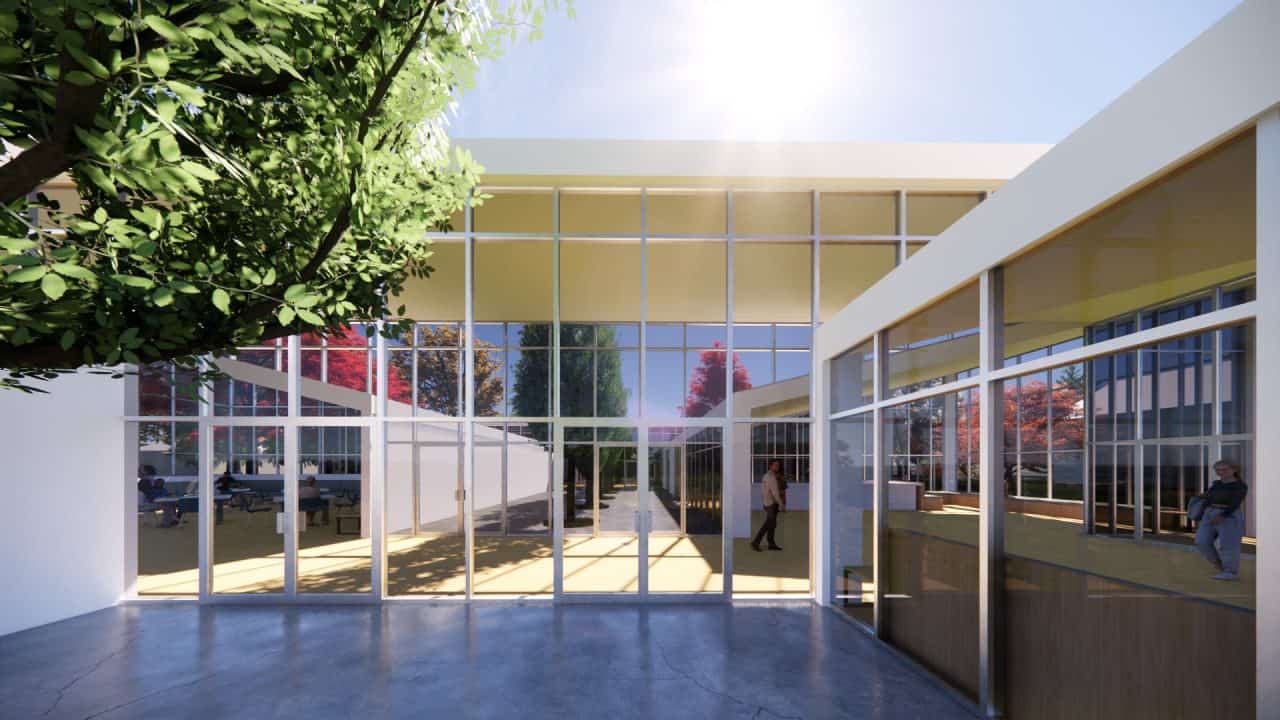 Fachada y patios interiores de la Biblioteca Leo Falicov en Bariloche.