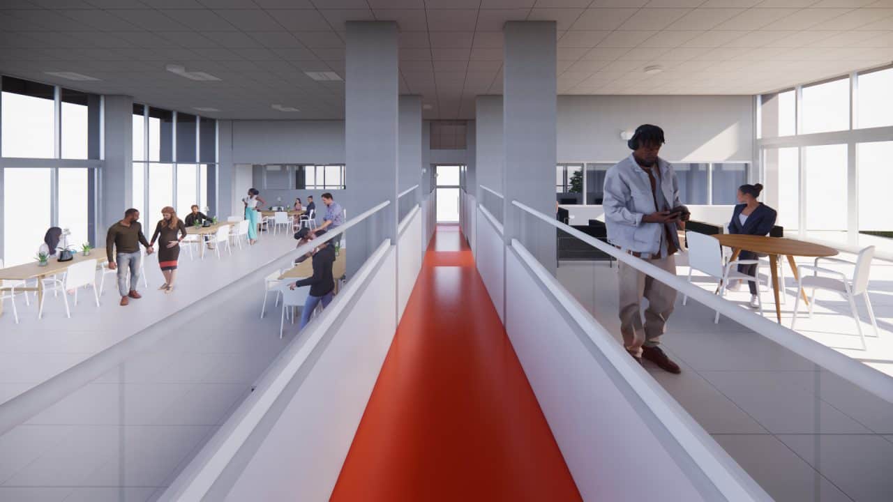 Vista de la plaza superior y puente peatonal del Centro de Desarrollo Humano de Matinilla, integrado al paisaje montañoso.
