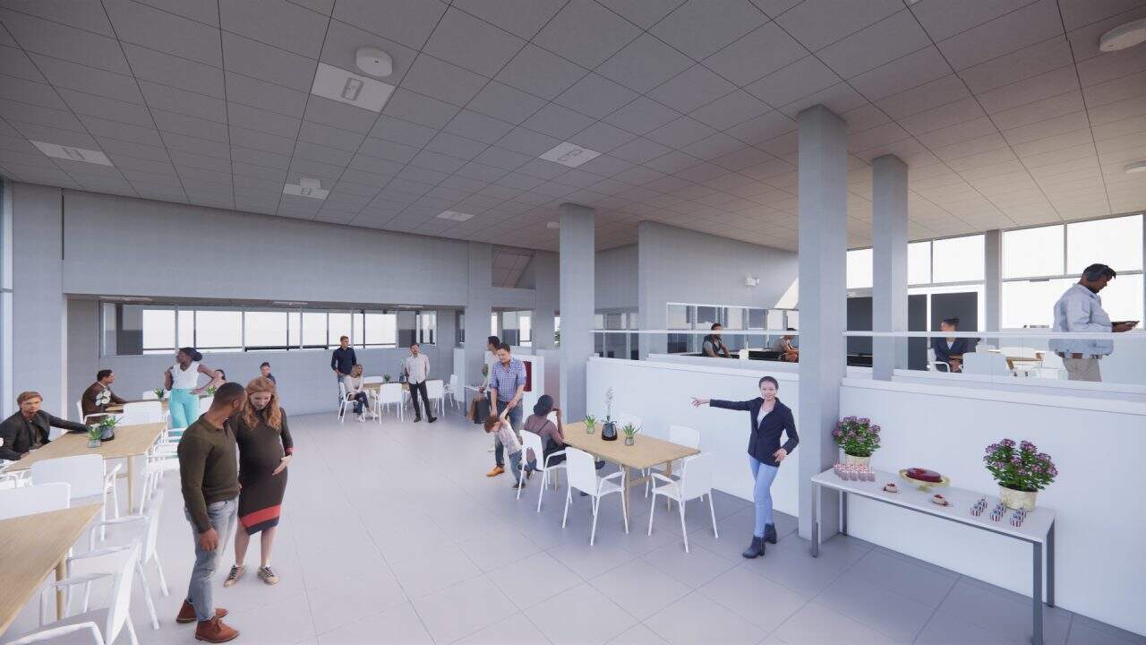 Vista de la plaza superior y puente peatonal del Centro de Desarrollo Humano de Matinilla, integrado al paisaje montañoso.