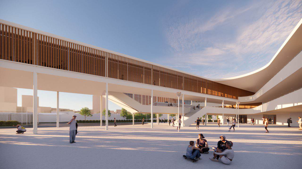 Vista del Colegio de Santiago en Cartago, integrado con el bosque y el paisaje agrícola circundante.