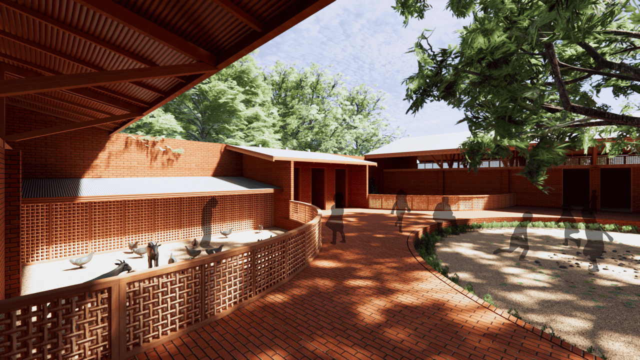 Vista de la Escuela Primaria de Marsassoum con patio central y árbol simbólico rodeado por aulas y espacios comunitarios.