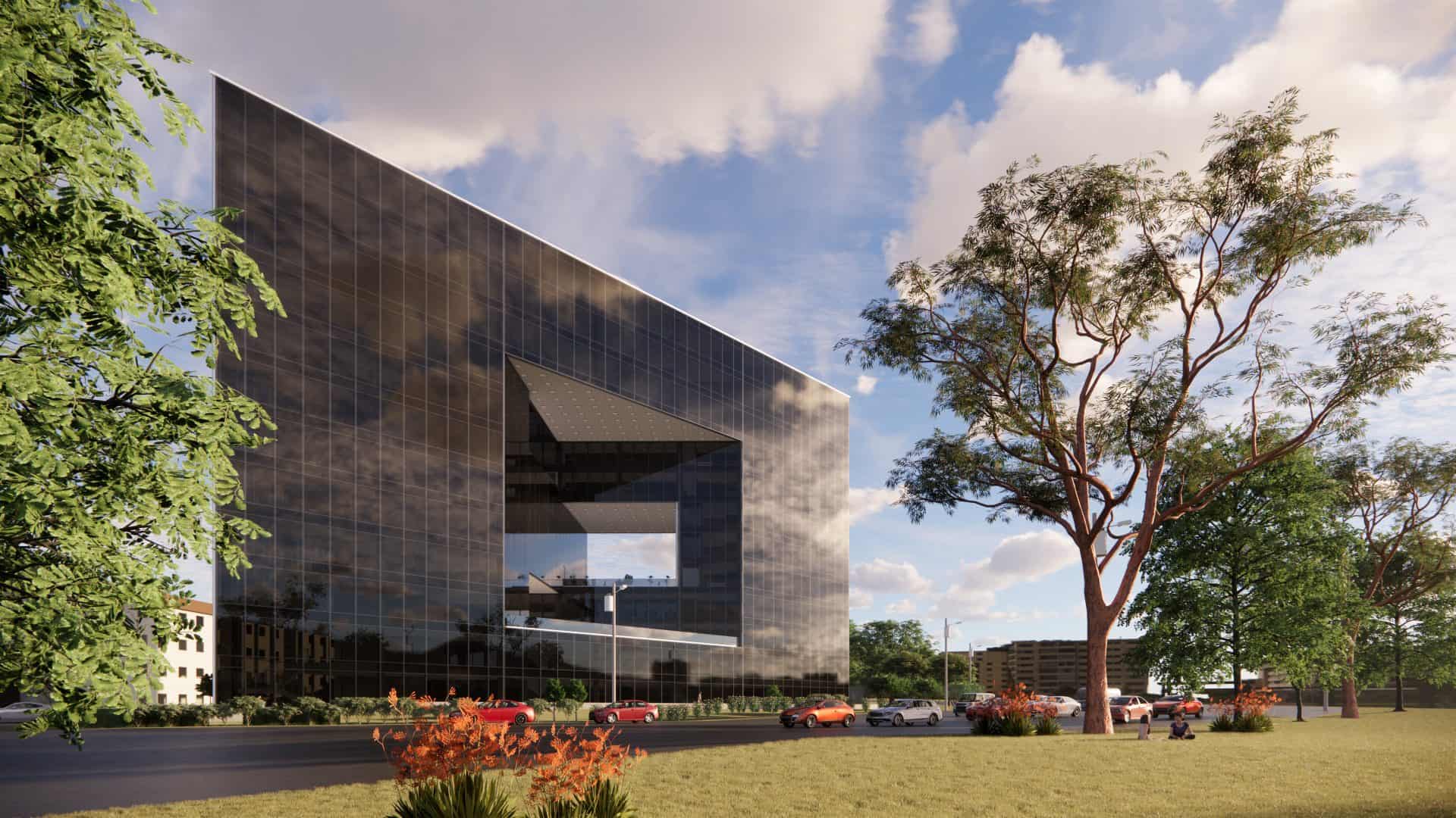 Vista del edificio triangular en el Valle Central con terrazas y fachadas de vidrio.