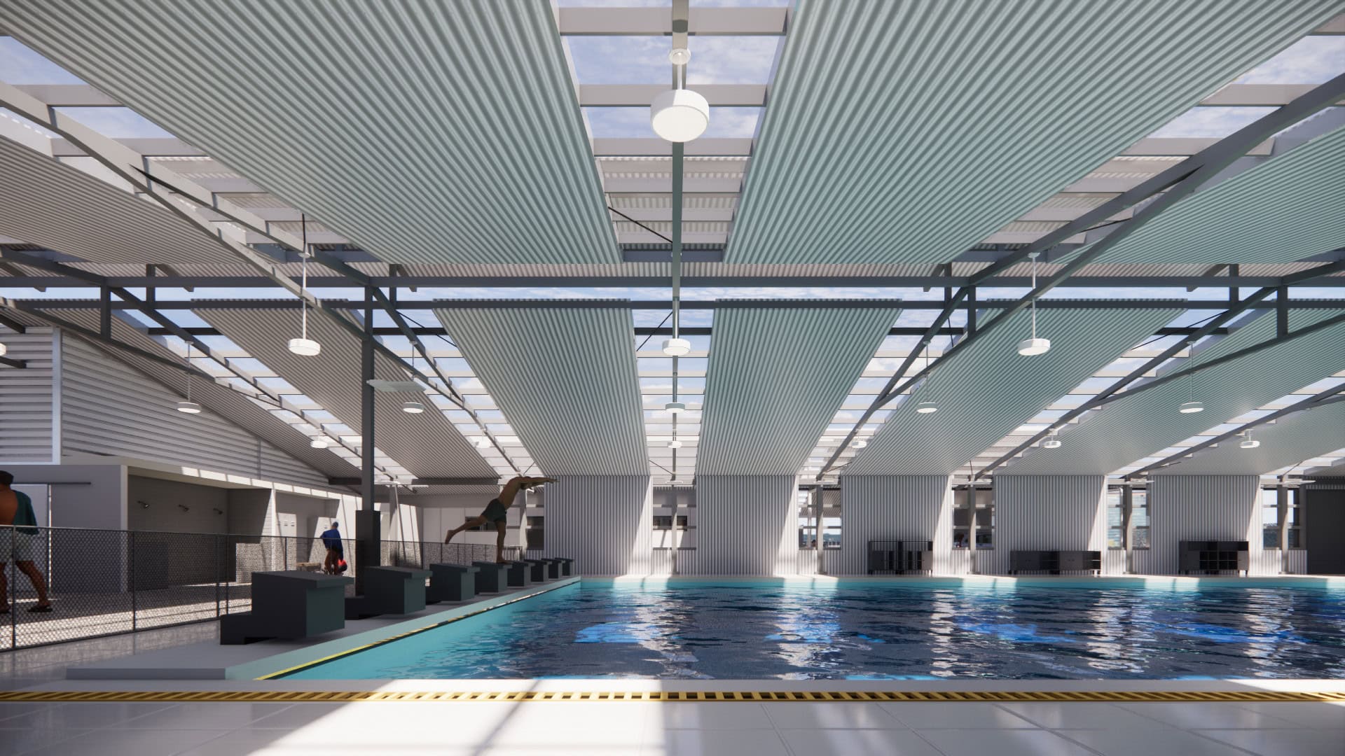 Vista de las piscinas recreativas renovadas en Goicoechea con áreas verdes y plaza peatonal